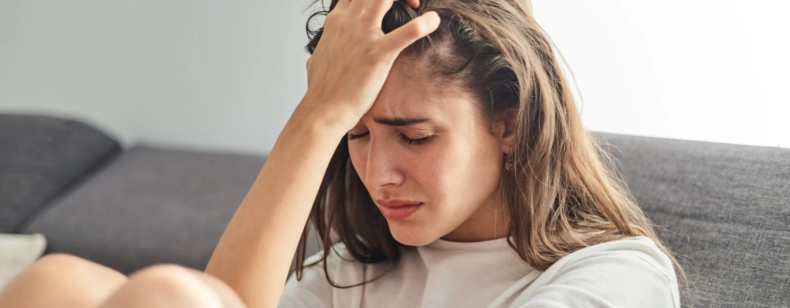 Sad woman suffering from Restrictive Food Intake Disorder